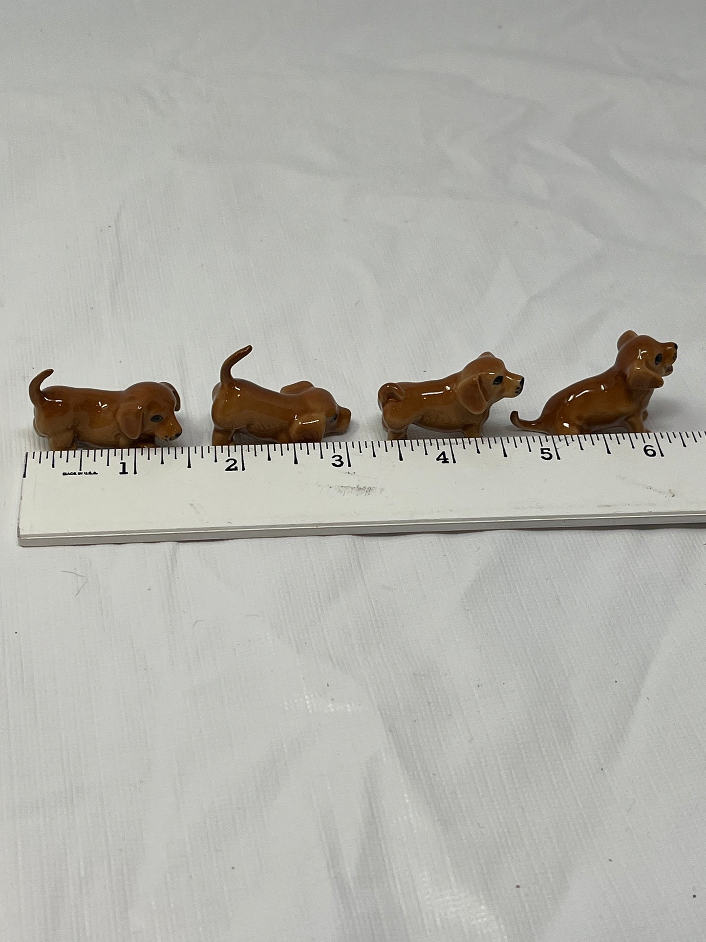 Set of 4 Miniature Ceramic Puppy Figurines – Brown, Hand-Painted